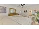 Bedroom features stylish furnishings, decor, doors to other rooms, and a comfortable bed at 4321 Shamrock Dr, Venice, FL 34293