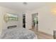 Bedroom with a closet and entry into a shared living space at 4321 Shamrock Dr, Venice, FL 34293