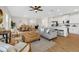 Inviting living area with modern furnishings and an open layout to the kitchen and dining spaces at 4390 Asteria Ter, North Port, FL 34287