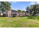 Spacious backyard showcasing the home's outdoor space at 458 Cerromar Rd # 382, Venice, FL 34293