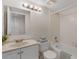 Well-lit bathroom with tub, shower, and ample storage at 458 Cerromar Rd # 382, Venice, FL 34293