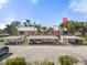 Condo complex parking with palm trees at 458 Cerromar Rd # 382, Venice, FL 34293