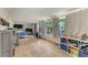 Spacious basement featuring hardwood floors, lots of lighting, and many windows at 4616 Leeta Ln, Sarasota, FL 34234