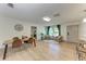Open living space featuring a dining area, seating area, and modern flooring at 4616 Leeta Ln, Sarasota, FL 34234