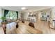 Open concept living space with a dining area, seating area, and bright, airy ambiance at 4616 Leeta Ln, Sarasota, FL 34234