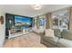 Comfortable living room with stylish furniture, an eye-catching coffee table, and an open concept layout at 4616 Leeta Ln, Sarasota, FL 34234