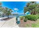 Park scene with a view of the water, dock, and nearby houses at 4616 Leeta Ln, Sarasota, FL 34234