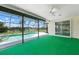The enclosed pool is surrounded by greenery and a beautiful backyard view at 465 Laurencin Dr, Nokomis, FL 34275