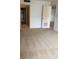 A vacant living room with multiple doorways and no furniture at 512 W Venice Ave # 205, Venice, FL 34285