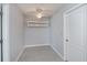 Bright room features tile floors, light gray walls, ceiling fan and built-in shelving for storage at 552 Bellaire Dr, Venice, FL 34293