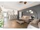 Inviting living room featuring neutral tones, stylish decor, and an open layout, great for entertaining at 5739 Sabal Trace Dr # 102, North Port, FL 34287
