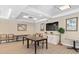 Bright meeting room with neutral tones, comfortable chairs, and elegant decor at 5739 Sabal Trace Dr # 102, North Port, FL 34287