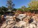 Outdoor fire pit area with comfortable seating, perfect for gatherings and relaxation at 5853 Semolino St, Nokomis, FL 34275