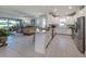 Open-concept living space featuring kitchen with modern appliances and view to living room at 5853 Semolino St, Nokomis, FL 34275
