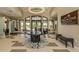 The lobby showcases stylish decor and a grand chandelier, creating an inviting atmosphere at 5853 Semolino St, Nokomis, FL 34275