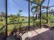 Enjoy the screened patio offering gorgeous views of the surrounding pond and landscaping at 5853 Semolino St, Nokomis, FL 34275