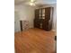 Spacious bedroom with wood-look floors and ceiling fan, ready for new décor at 5966 Willows Bridge Loop, Ellenton, FL 34222