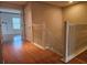Hallway area with access to rooms and a staircase at 5966 Willows Bridge Loop, Ellenton, FL 34222