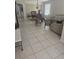 Tile floors throughout a spacious open floor plan make this a perfect space for living at 5966 Willows Bridge Loop, Ellenton, FL 34222