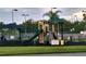 Community playground with multiple play stations and safety first guidelines at 5966 Willows Bridge Loop, Ellenton, FL 34222