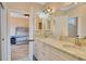 The dual vanity is adjacent to the bedroom at 63 Palm Dr, Placida, FL 33946