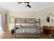 The bedroom showcases a gray bunk bed, wood-look floors, and modern decor at 63 Palm Dr, Placida, FL 33946