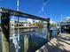 Home with boat lift on the water at 63 Palm Dr, Placida, FL 33946