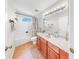 Bathroom featuring a vanity with a sink, tub with shower, and tile flooring at 632 Tanana Fall Dr, Ruskin, FL 33570