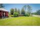 Well manicured River Bend community entrance with lush green lawns at 632 Tanana Fall Dr, Ruskin, FL 33570