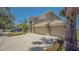 Charming two-story home with three-car garage and beautiful landscaping at 632 Tanana Fall Dr, Ruskin, FL 33570