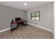 Small bedroom featuring a desk and a window at 6497 Honeycomb Cir, North Port, FL 34291