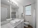 Bright bathroom features a modern sink, granite countertops and a walk-in shower at 678 Clear Creek Dr, Osprey, FL 34229