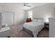 This cozy bedroom features neutral carpeting and paint, as well as ample closet space at 678 Clear Creek Dr, Osprey, FL 34229