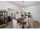Dining room open to the kitchen and living room areas at 678 Clear Creek Dr, Osprey, FL 34229