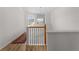 Upstairs landing offers views through windows to the exterior at 678 Clear Creek Dr, Osprey, FL 34229