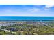 Enjoy the pristine blue ocean views and lush greenery from this home's community at 755 Mohawk Rd, Venice, FL 34293