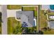 Aerial view showcasing the house, roof, and the backyard at 755 Mohawk Rd, Venice, FL 34293