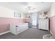 Charming bedroom featuring day bed, plush carpet, and a white ceiling fan with light at 755 Mohawk Rd, Venice, FL 34293