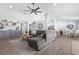 Open-concept living room flowing into dining area and kitchen, perfect for modern living at 755 Mohawk Rd, Venice, FL 34293