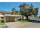 Carport exterior with secure storage unit access for this condo at 821 Waterside Dr # 106, Venice, FL 34285