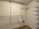 Spacious closet with wire shelving providing ample storage space at 821 Waterside Dr # 106, Venice, FL 34285