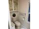 Bathroom featuring a toilet, marbled counters and cabinet and a window at 902 Jolanda Cir, Venice, FL 34285