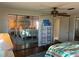 Spacious bedroom with mirrored closet doors, offering ample storage and style at 902 Jolanda Cir, Venice, FL 34285