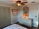 Bedroom featuring a dresser, mirror, and closet with an overhead fan at 902 Jolanda Cir, Venice, FL 34285