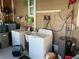 Functional laundry area equipped with a washer, dryer, and utility sink at 902 Jolanda Cir, Venice, FL 34285