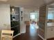 Open-concept living room showcasing decor, modern flooring, and bright, natural light at 902 Jolanda Cir, Venice, FL 34285
