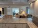 Open-concept living room showcasing decor, modern flooring, and bright, natural light at 902 Jolanda Cir, Venice, FL 34285