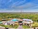 Community center featuring a pool, clubhouse, and recreational facilities in a picturesque setting at 9048 Luna Ln, Sarasota, FL 34241