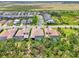 Bird's eye view of the property, highlighting the pool, landscaping and prime location in a desirable neighborhood at 9048 Luna Ln, Sarasota, FL 34241