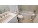 This light and bright bathroom features a vanity sink and tiled shower/tub at 9048 Luna Ln, Sarasota, FL 34241
